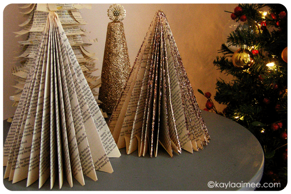 "How To: Make A Paperback Christmas Tree" at http://www.kaylaaimee.com/how-to-make-a-paperback-christmas-tree/